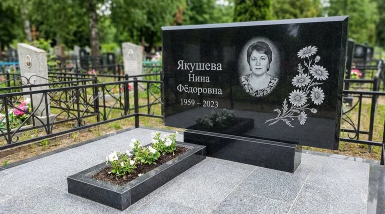 Памятник с гравировкой ромашек — выполненная работа «Якушева» в Москве