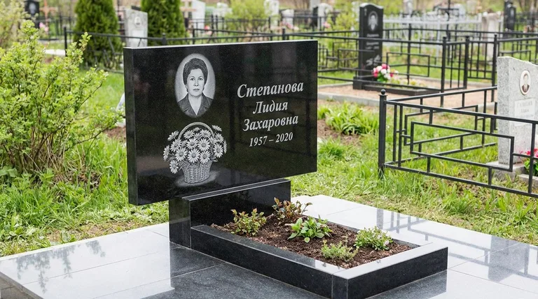 Памятник с гравировкой ромашек — выполненная работа «Степанова» в Москве