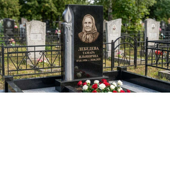 Мемориал с высеченной свечой из черного габбро-диабаза