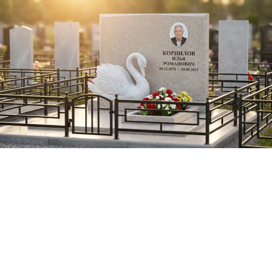 Памятник с лебедем из белого мрамора с овальным портретом
